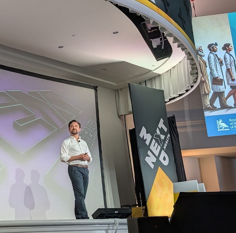 Ryan Kerstein presenting at a healthcare innovation conference